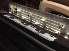 just FYI - the front sill is different. but same principle. no screws to turn, nothing. just pop off, pop in the new one.