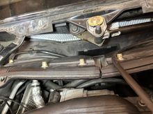 Clearance of the wiper linkage is about a half inch here when running. The housing can be shifted side to side a little before tightening and I shifted it a tad to the toward passenger side for better clearance.