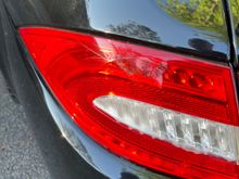 The adhesive isn’t visible on the light with the colored lens.