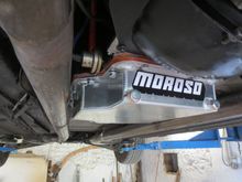 The gold-coloured cylindrical thing sticking out.