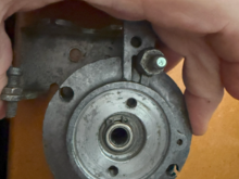 This is how the capstan sits with no spindle and shows how the spring pushes the capstan over. The only thing that stops this is the spindle - but that means that the bushing (can be seen in the centre) wears on one side - in fact the spindle ends up not being vertical.