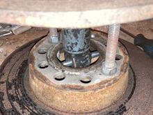 I’ve used a short threaded rod to hold this end of the shock absorber.