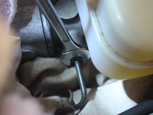 When you 'Crack' this Nut be VERY CAREFUL!
It will contain Brake Fluid under High Pressure!
which could then Squirt out in any direction.
Don't let any Brake Fluid get on the Paint!