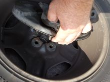 Plaacing the hub assembly inside the lose wheel.