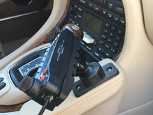 How it's mounted.  That is a standard AMPS mount backplate.  You just have to be a bit creative and think outside the box; what Kuda puts on their site is only a suggested way of mounting...doing a little investigation and web searching will lead to many creative ways of doing what you need to do without having to drill into your $2000. console, stick tape on your veneer, or have things rattling around the cockpit.