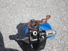 The mating surfaces cleaned.  You can see the dramatic difference between before and after.  At this point, put the caliper back together and you are golden.  Just don't poke a hole in the weather seal for the piston