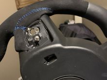 Since the threads for where your paddles go were stripped when I received this wheel, I have drilled, tapped and re-trheaded to accept a slightly larger screw that still works with our paddle shifters, you can see in this photo and the next