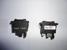 DAC 7526 is an aftermarket switch, whereas the OEM DAC 7527 made by TRW is on the right