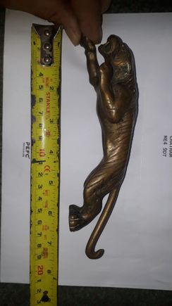 Hi all ,wondered if anyone can help, my late father, bought home this leaper over 50 years ago from a jaguar that was being scrapped. It has sat in the loft for years, however its design is unusual, particularly the upcurl of the tail, and the stripes as opposed to spots (which on close inspection have original casting marks) I would be grateful if anyone can shed any light on it. Have other pics if needed
Kind regards Graham