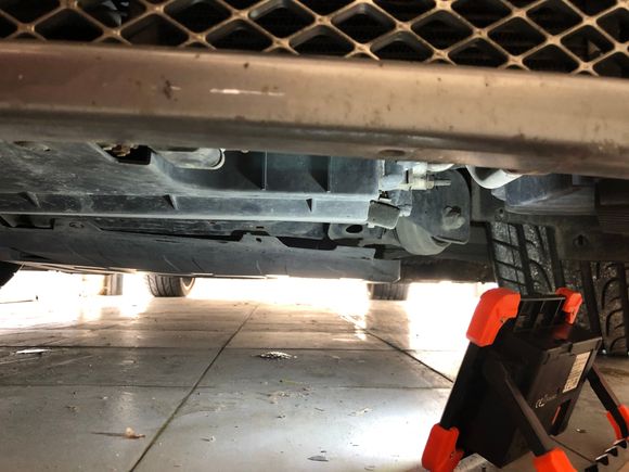 Remove undershield ...