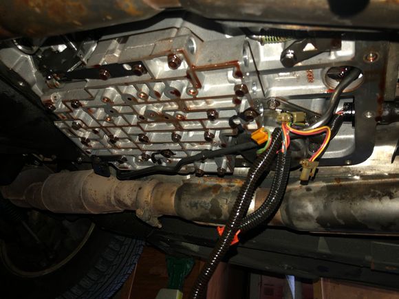 With everything removed. Some great videos on YouTube that show how each solenoid comes out. 