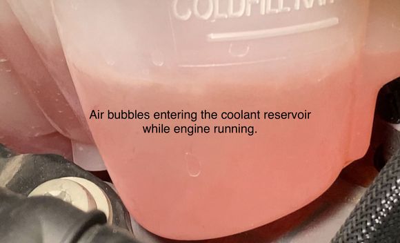 Air bubbles in coolant tank. Normal??