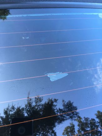 This is the rear convertible window with a sizable chip out of the inside glass tinting. Should I pull it all off and have it totally redone or can it be repaired?