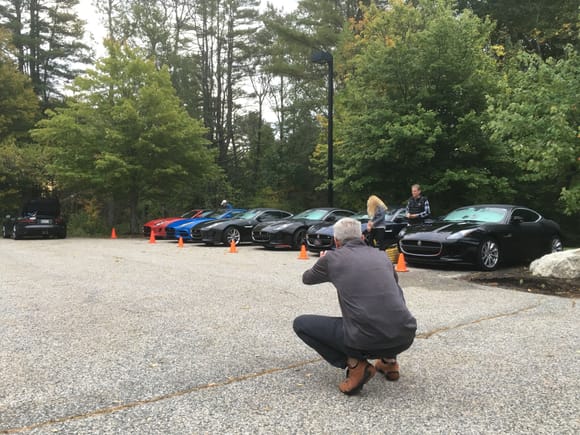 Director of Sales for Continental Tire Sean McDermaid taking pictures of all the cars to determine who is on Continental Tires and who is on anything else. 