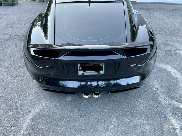 The rear is completely debadged and the tail lights tinted.