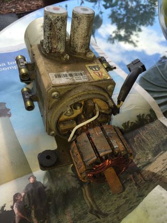 Notice the motor is held in place by four Torx 25 bolts.