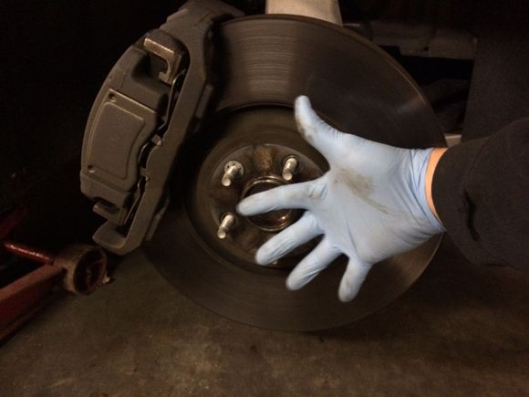 Massive front rotor. I have fairly large hands, can easily palm a basketball.