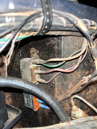 the two relays on the left wheel well.