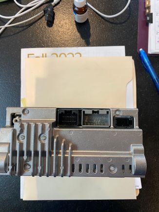 Audio module rear connectors with 3 multi-pin connectors and Fakra coax connector. Module is upside down to get a picture of the connectors. 