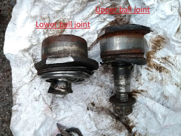 Upper and lower ball joints after removal. It seemed a good idea to chop off the shaft of the lower one - might have been because of the tool sizes