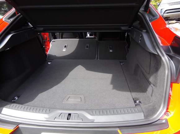 With seats folded down. Not quite flat but usable. 