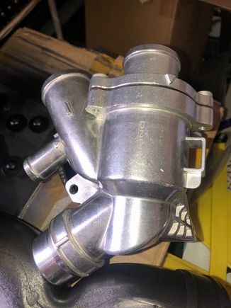 Alloy Thermostat Housing. The plastic one is OK too. But the seal is questionable!