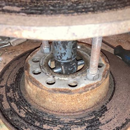 I’ve used a short threaded rod to hold this end of the shock absorber.