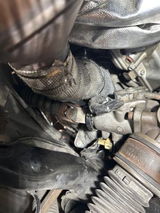 Here's where I added another layer of heat wrap, the clearance is really tight. You can see the hard line that I rewrapped too.