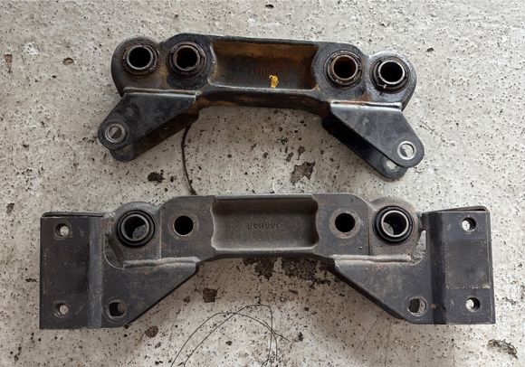 The hole sizes are different, the new bracket will have to be drilled in order to fit on the differential studs