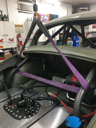 Rear chain fall lifted the rear of the car by the cage.
