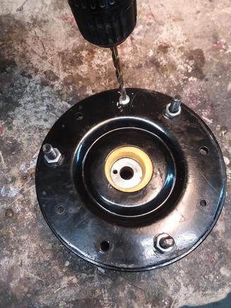 Drill out the old rivets, note how center is not centered