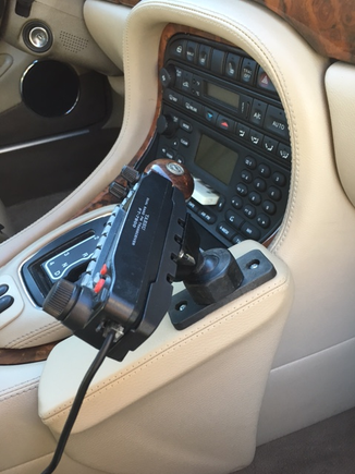 How it's mounted.  That is a standard AMPS mount backplate.  You just have to be a bit creative and think outside the box; what Kuda puts on their site is only a suggested way of mounting...doing a little investigation and web searching will lead to many creative ways of doing what you need to do without having to drill into your $2000. console, stick tape on your veneer, or have things rattling around the cockpit.