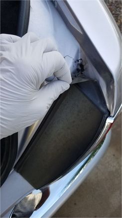 Pulling large rubber 'flange' -some glue holding it 