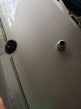 I broke the dang antenna trying to remove it. No it does not just come out when pulling up on it.
