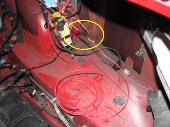 Pulling the wire through the rear bulk head grommet