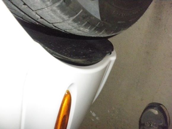 Move wheel well cover to gain access to bumper cover.