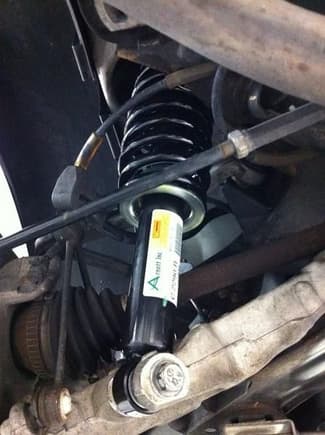 This is a picture of the Arnott C-2290 Rear Coil Spring installed in one of Arnott's test cars.