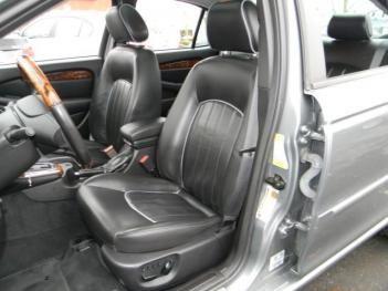 Charcoal leather with heated power seats and leather beaded trim.