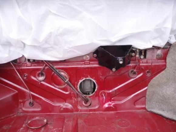 Safety first, covered the fuel tank with plactic to prevent rogue sparks from the hole saw going where I didn't want them. I also disconnected the negative post of the battery. A few extra minutes, with no regrets.... some things you don't get a do-over.