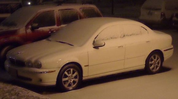 Notice how the accumulating snow follows the gorgeous contours on the front of the hood.