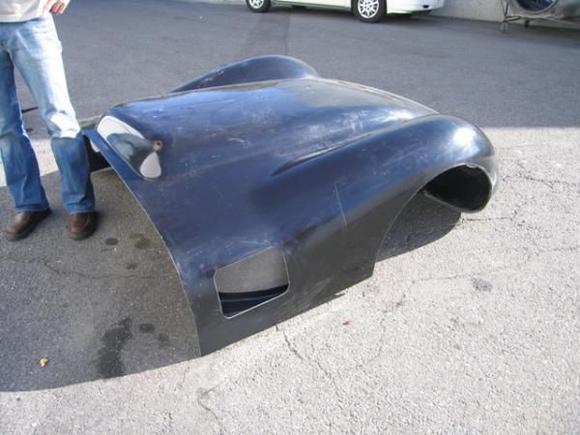 And a few shots of my virgin body before I got my mitts (and my sawsall) on it.  The hood shell:
