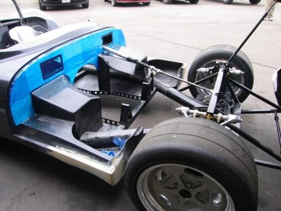 Wow, clean and shiny!  Also VERY empty looking.  Boy was this easy to push around!!  Next we covered the aluminum with a sticky thick plastic to protect the finish: