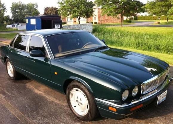 Just finished waxing my Jaguar. I don't know if you can see, but there is some oxidation starting on the car. I am getting the car painted this fall.
