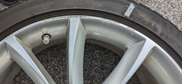 note road rash above and to right of air valve