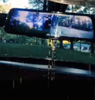 Rear and front split screen cameras. Screen is the mirror itself. Swipe once front view swipe again rear view swipe again get split screen.