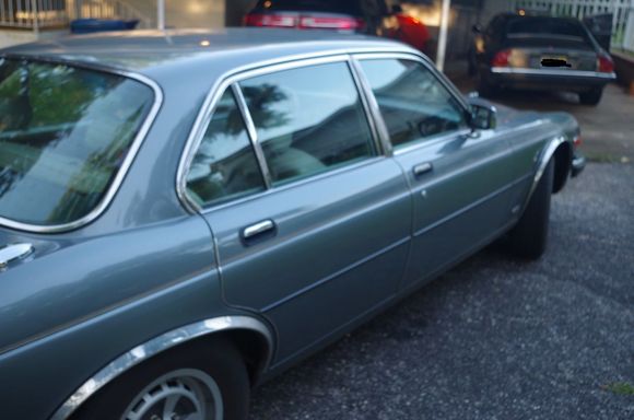 Sorry for the blur, but you can see how it gets "blue" from this angle. That's its big brother XJS top right.