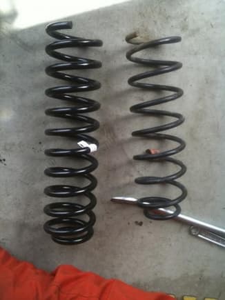 Time to Lift this thing! OME HD 4&quot; springs .vs. Stock springs on the right! big difference