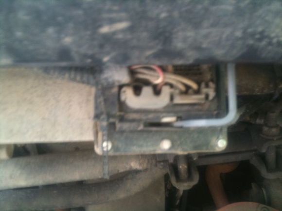 outside of sway bar plug under the cover