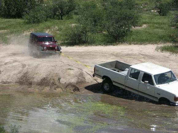 FORDS SUCK I pulled this ford all the way down reddington. This is the pond all the way on the back side (the easy way to chiva)