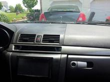 This is the before pic, as you can see it was basically all black. If you look right above my headunit, that little slot is where I put my usb plug. I figured when will I ever actually store anything there.
